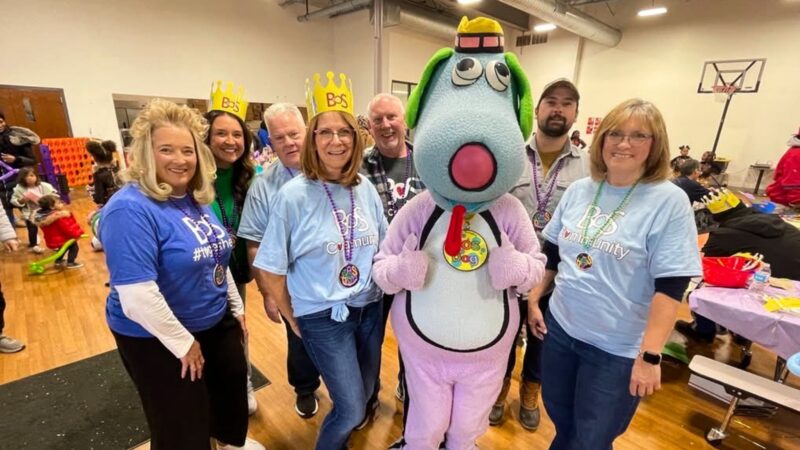 Bank of Springfield employees help organize donations at a local charity.